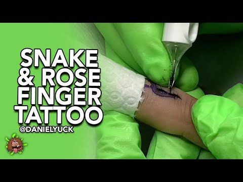 Snake & Rose Finger Tattoo